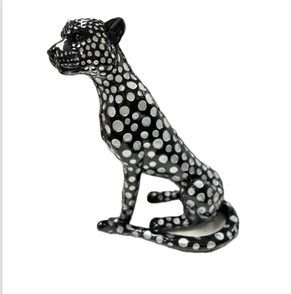 Black and Silver Sitting Jaguar
