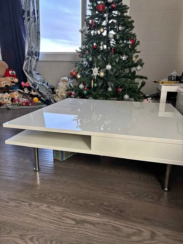 Coffee table with two drawers and slide in storage space