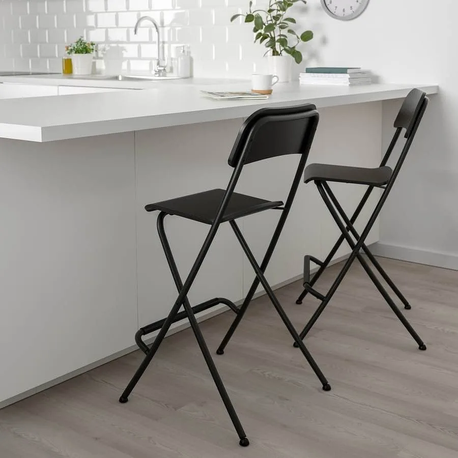 2 IKEA black Franklin bar stools image indicator(2)