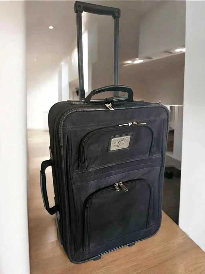 18 in Carry-On Luggage Rolling Suitcase 18H x14 L x 7 dp