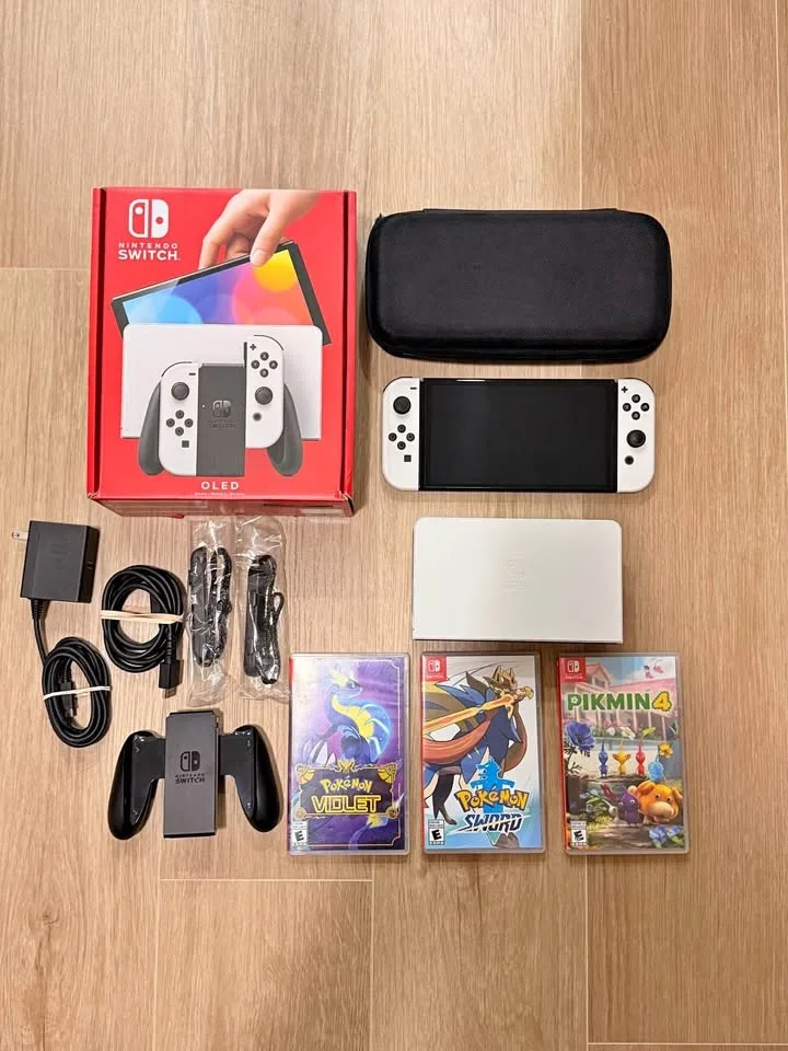 Nintendo Switch OLED – Excellent Condition + 3 Games!
