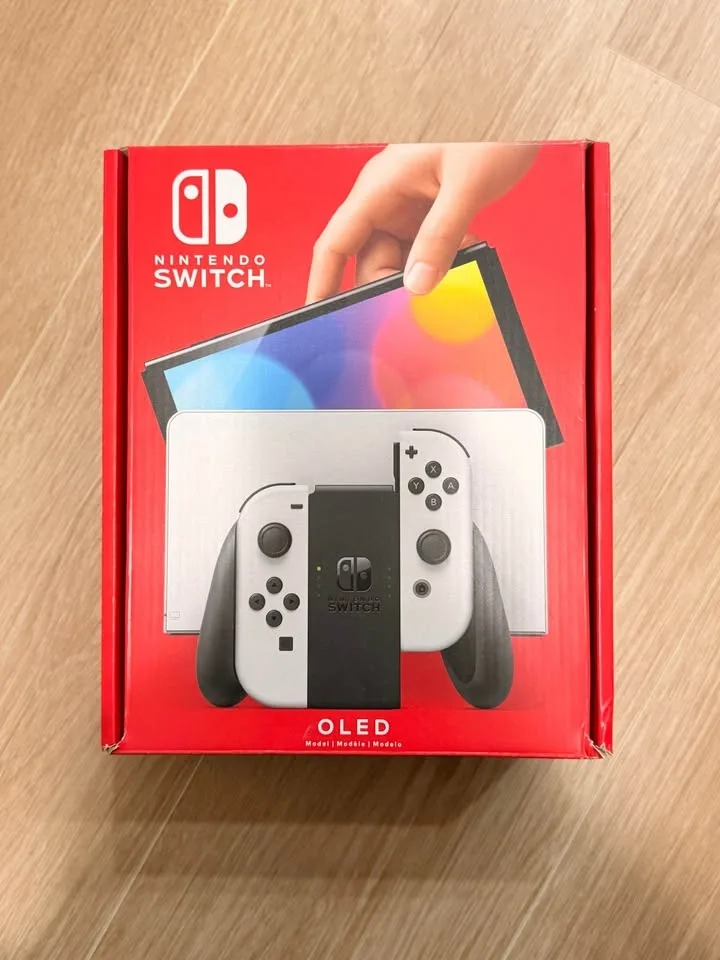 Nintendo Switch OLED – Excellent Condition + 3 Games! image indicator(7)