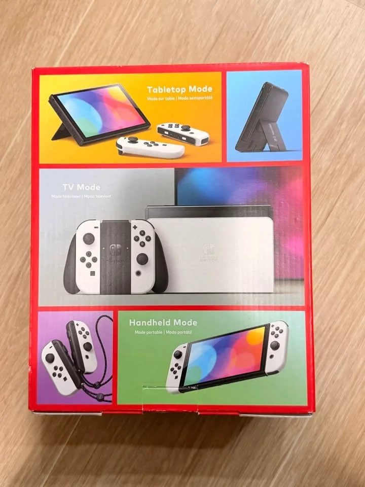 Nintendo Switch OLED – Excellent Condition + 3 Games! image indicator(8)