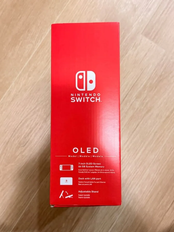Nintendo Switch OLED – Excellent Condition + 3 Games! image indicator(10)