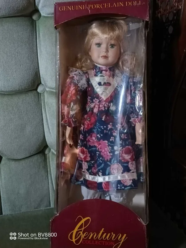 Century Porcelain Doll