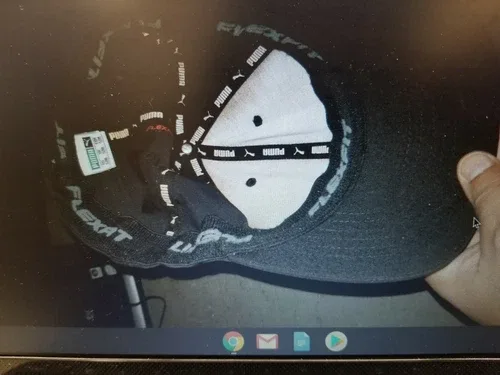 pair of hat, puma flex fit hat and a pink ones