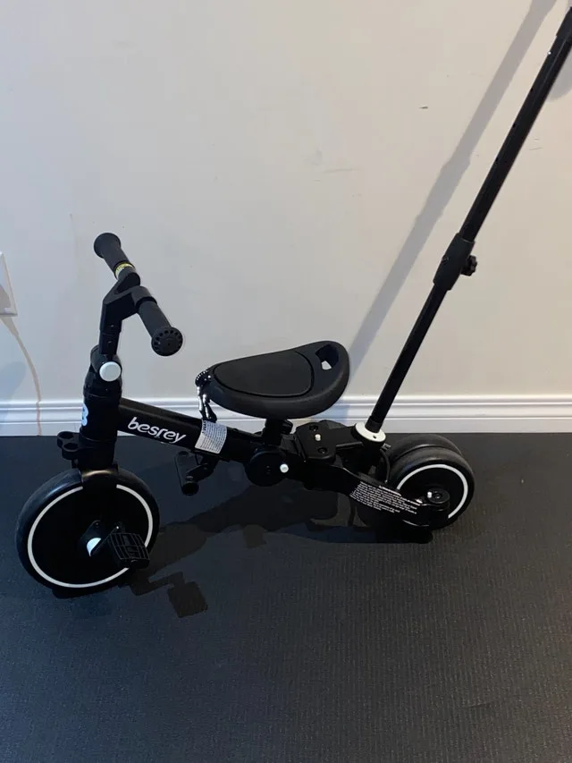 Used Toddler Bike w Handle 7-in-1 Trike image indicator(2)