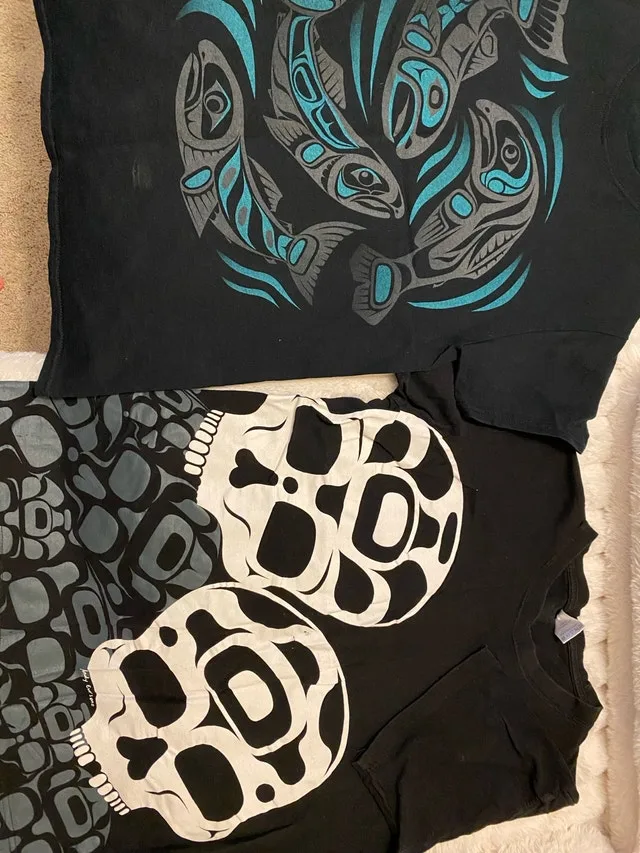 T-Shirts from the Airport - Small and Medium $5 for Both