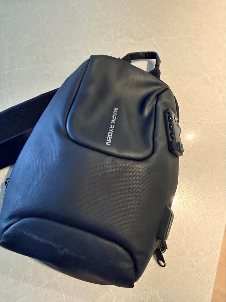 Mark Ryden cross over sling bag for travel