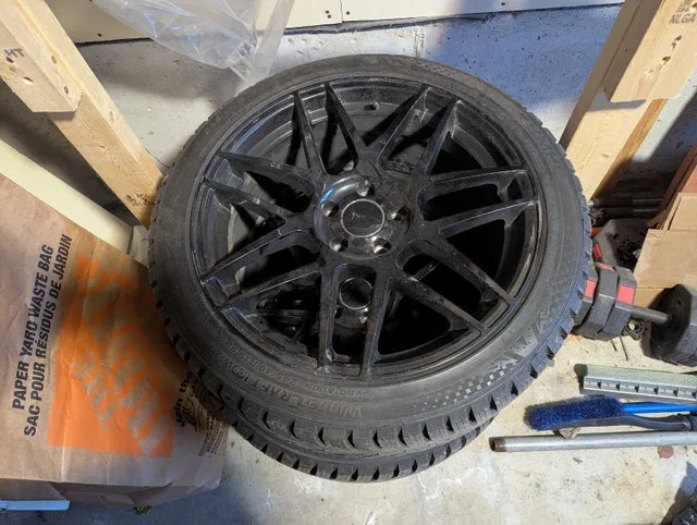 Winter Tire & Rim Package (245/40R19) — Like New image indicator(2)