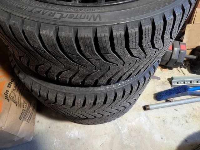 Winter Tire & Rim Package (245/40R19) — Like New image indicator(3)
