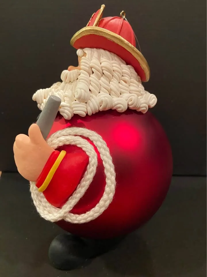 Vintage Fireman Santa Glass Ornament, by Department 56 image indicator(2)