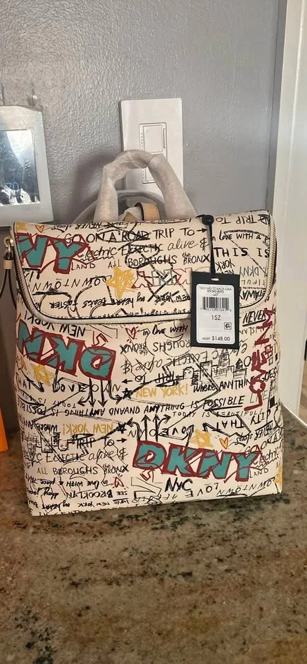 DKNY Faux Leather Exterior Medium backpack.