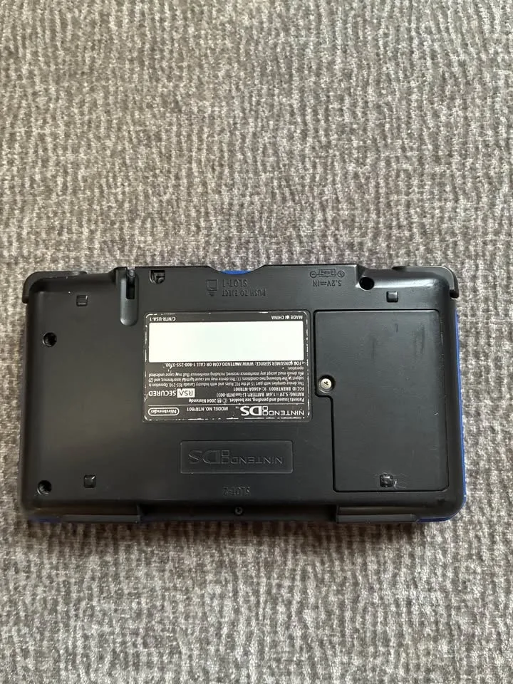 Nintendo DS with charger and games (leaf green and rugrats sold image indicator(3)