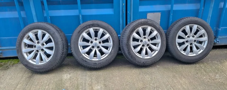 SET OF 4 KIA 16" WINTER RIMS - 2 DECENT TIRES