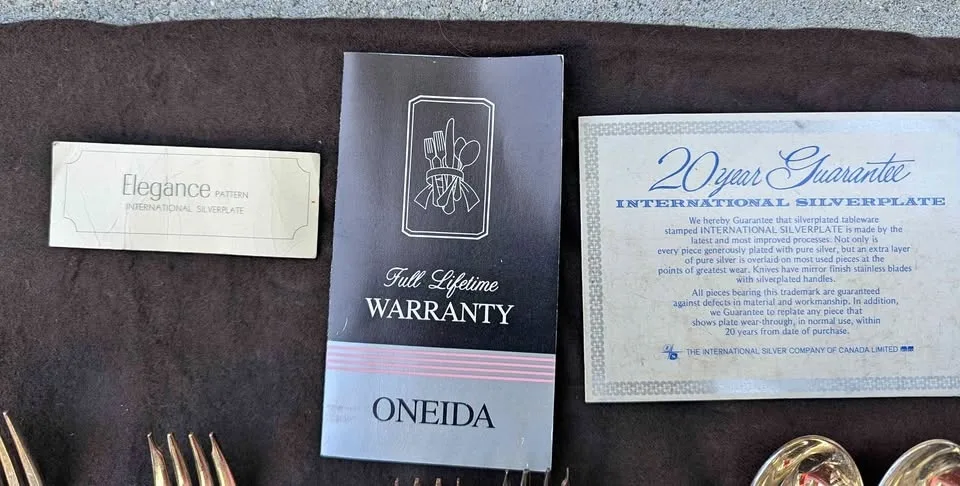 45 PIECE SILVER PLATED ONEIDA ELEGANCE FLATWARE CUTLERY