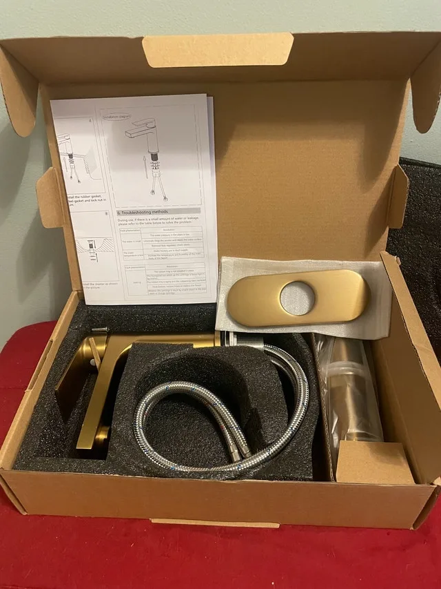 Modern vanity faucet. Brushed gold