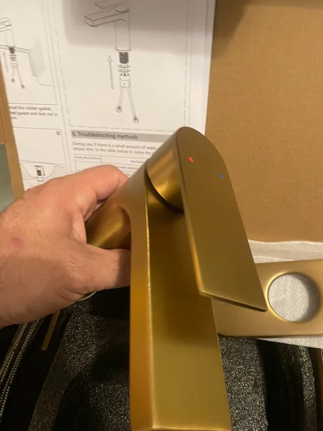 Modern vanity faucet. Brushed gold image indicator(2)