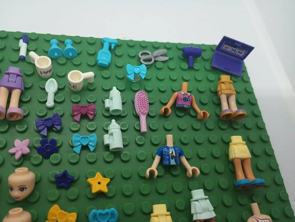 Lot of Lego Friends Minifigs and Minifig Parts and Accessories image indicator(4)