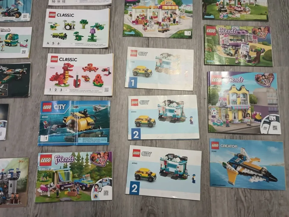 Lot of 50 Lego Building Instruction Manuals & 2 Containers image indicator(3)