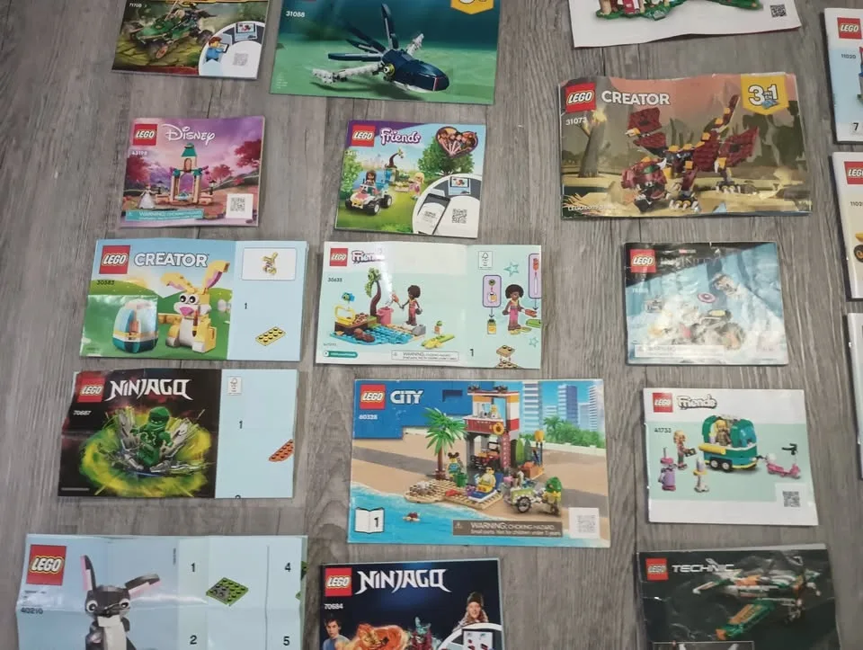 Lot of 50 Lego Building Instruction Manuals & 2 Containers image indicator(6)