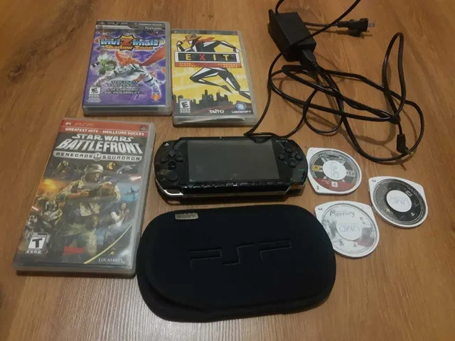 PSP console with games and accessoties image indicator(2)