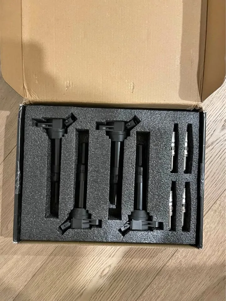 4 ignition coils and 4 iridium spark plugs