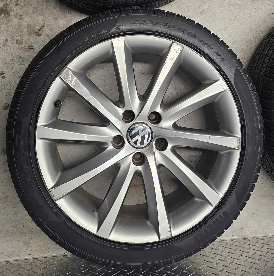Volkswagen passat oem rims with All Season Tires 235/40R18 image indicator(3)