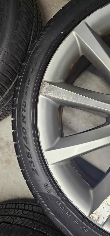 Volkswagen passat oem rims with All Season Tires 235/40R18 image indicator(6)