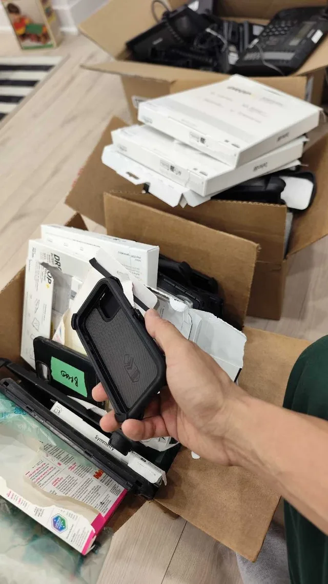 3 Boxes of cases for iPads and iphones