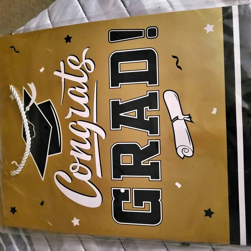 Gold and black graduation bag