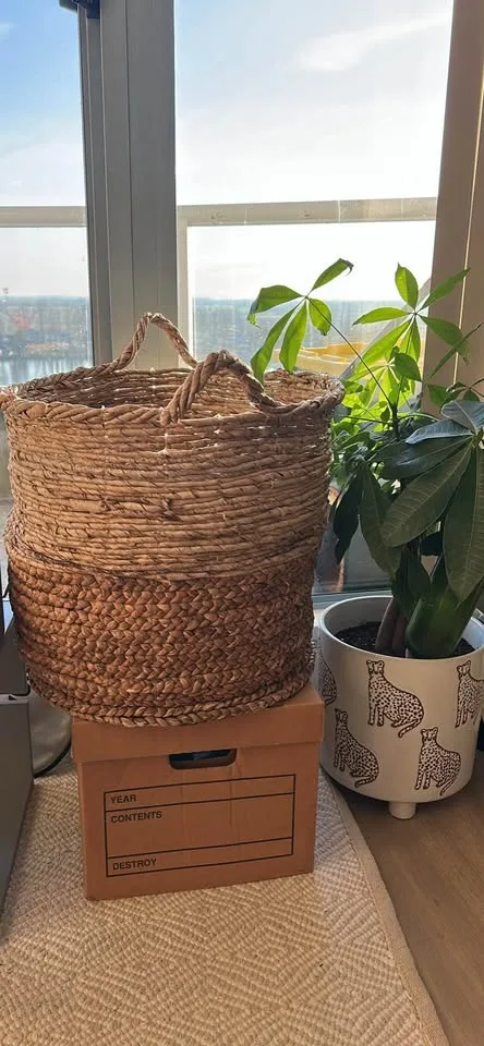 Woven basket for blankets etc.