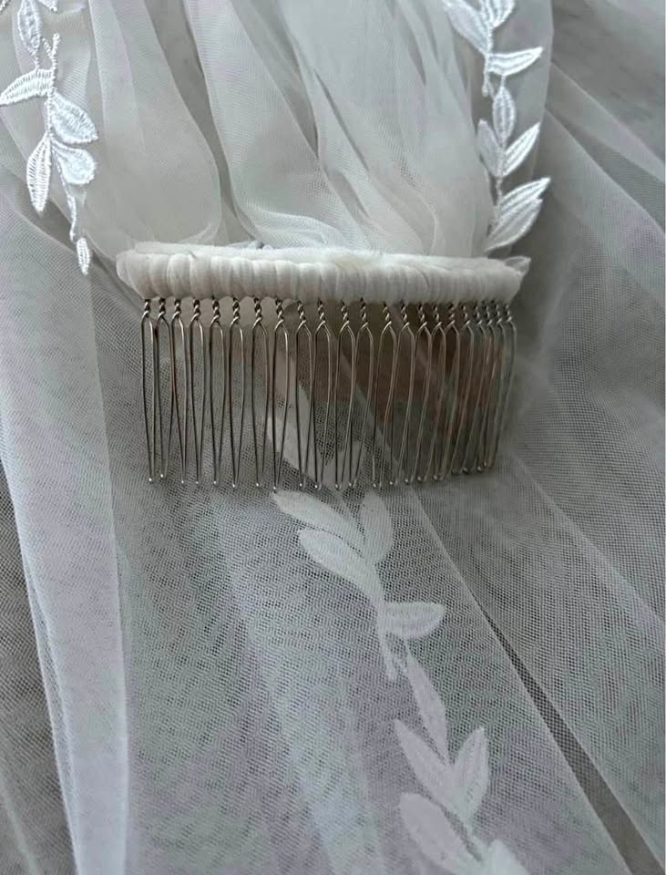 Vine edge soft white fingertip veil