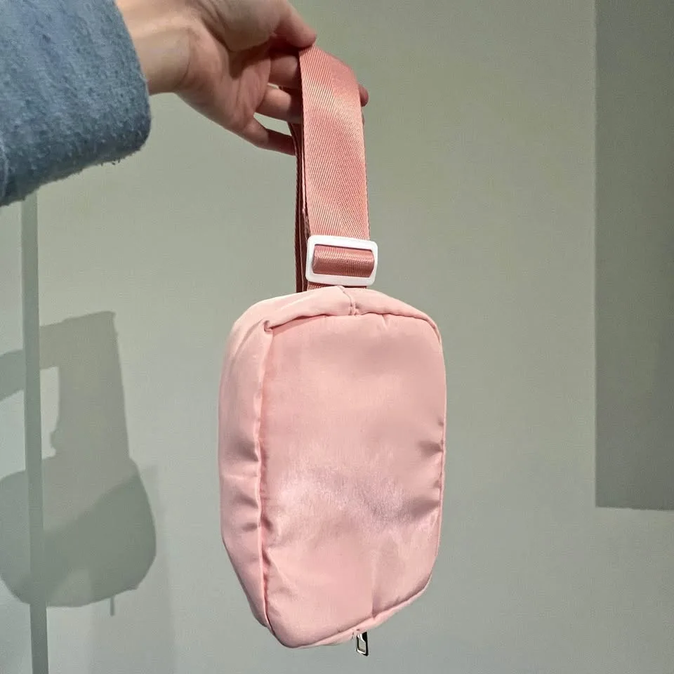Pink crossbody belt bag