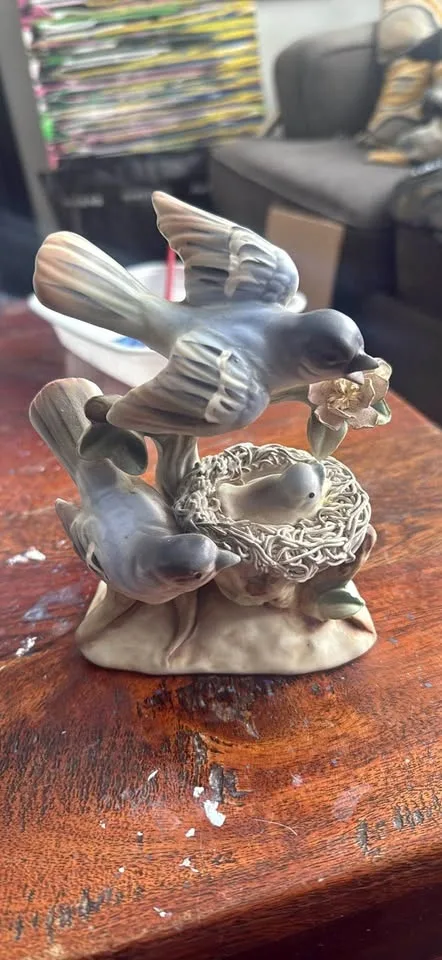vintage porcelain figurine mother bird with her baby birds