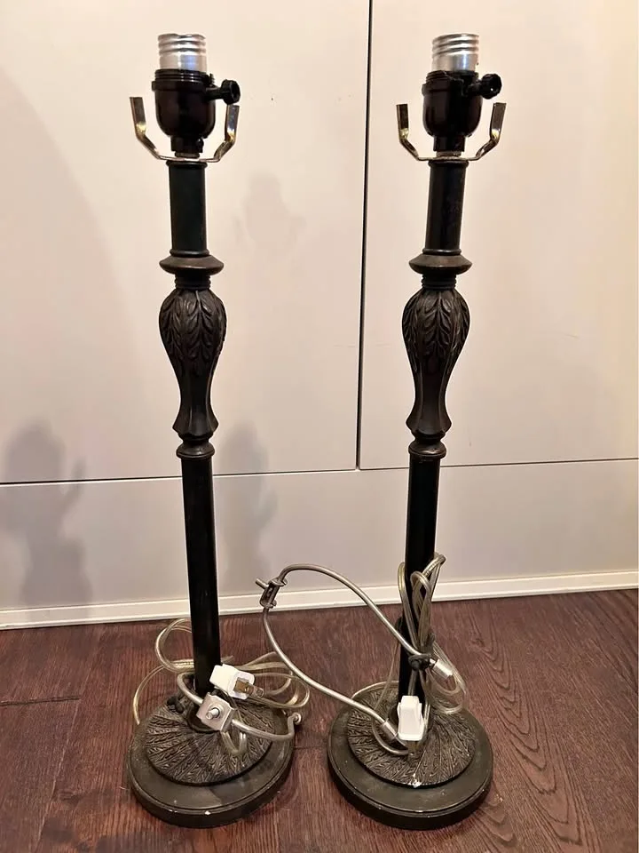 Pair of antique metal lamp bases.