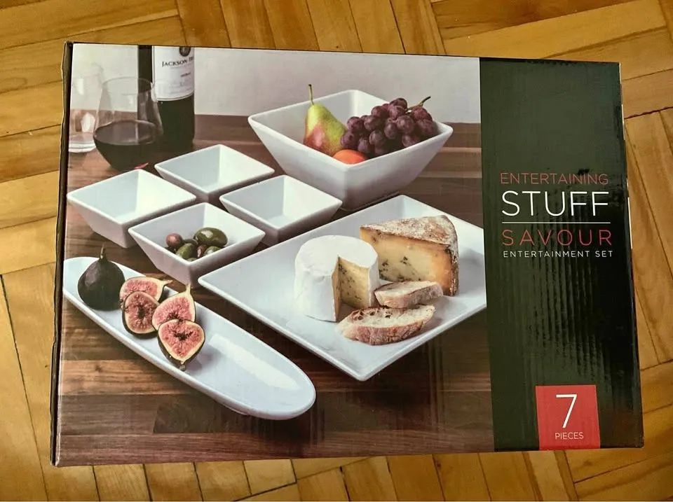 Featuring seven serving dishes. Brand new. Original price $50.