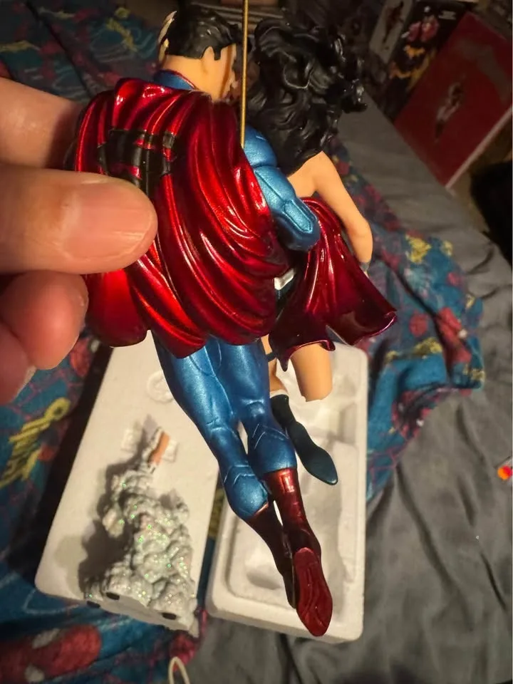 Superman/Wonder Woman damaged Jim Lee sculpture. image indicator(4)