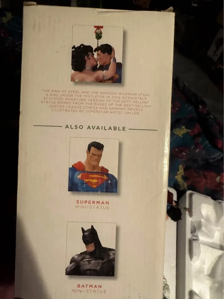 Superman/Wonder Woman damaged Jim Lee sculpture. image indicator(9)
