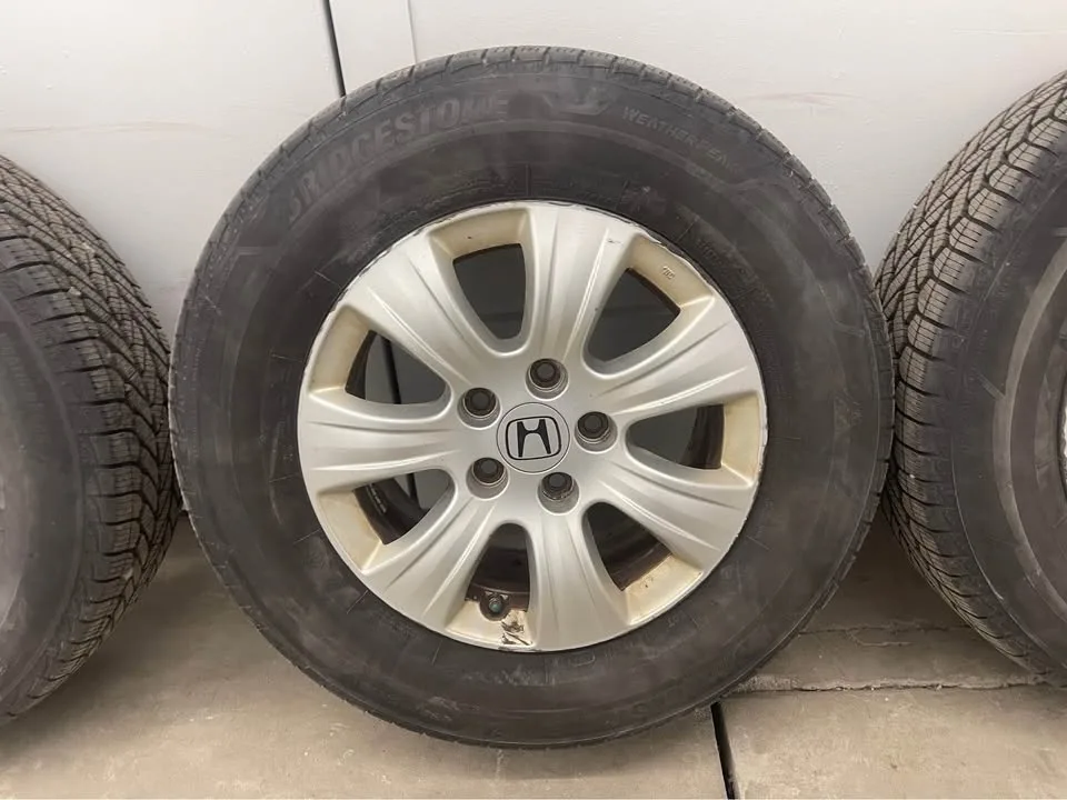 Honda Odyssey 16” Bridgestone Winter wheels W/TPMS image indicator(3)