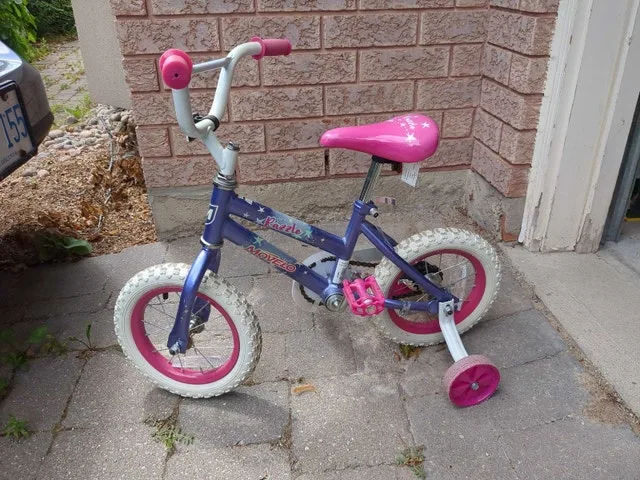 Girls bike with training wheels