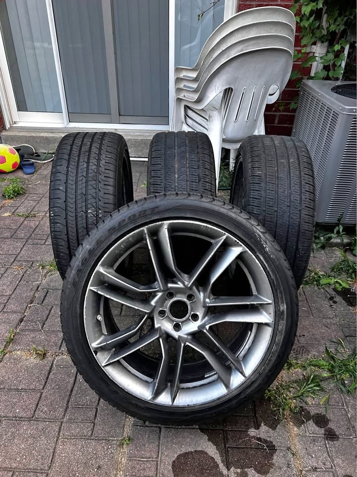 All season 19 inch Rims with tires, 255/40/19new tires. 5x100