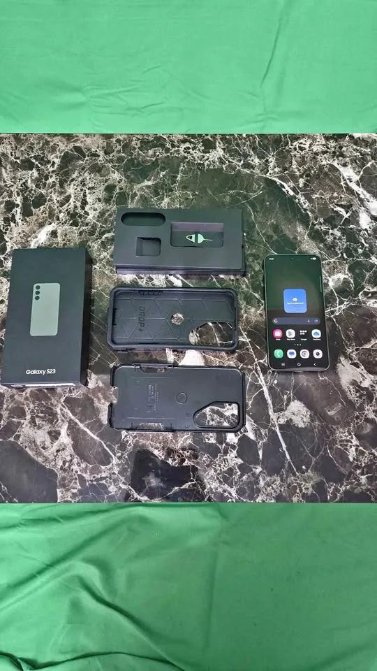 Samsung Galaxy S23 Phone + Otterbox Defender Case