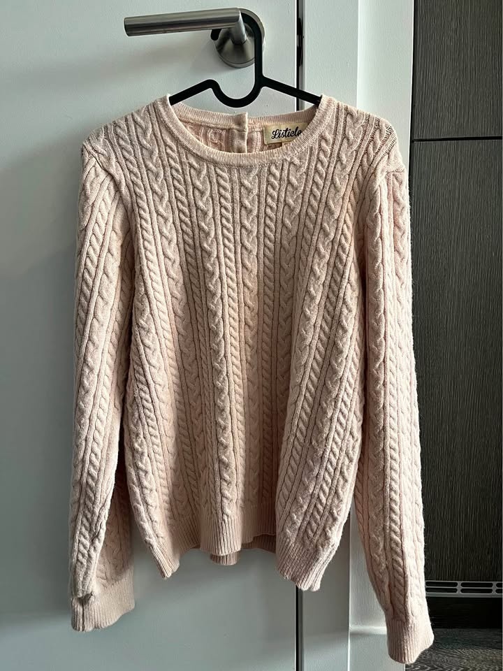 Soft pink knit sweater