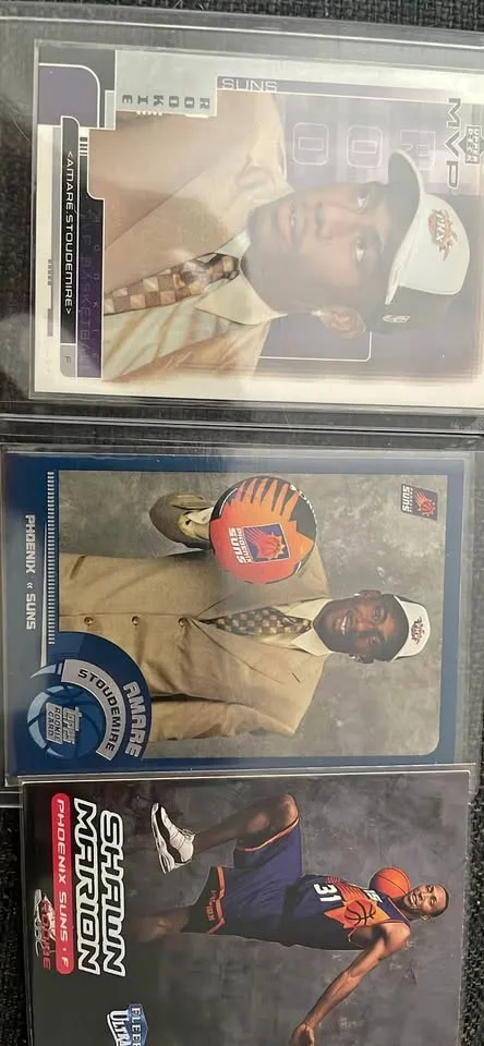 Two Amare Stoudemire Rookie Cards and One Shawn Marion Rookie Ca