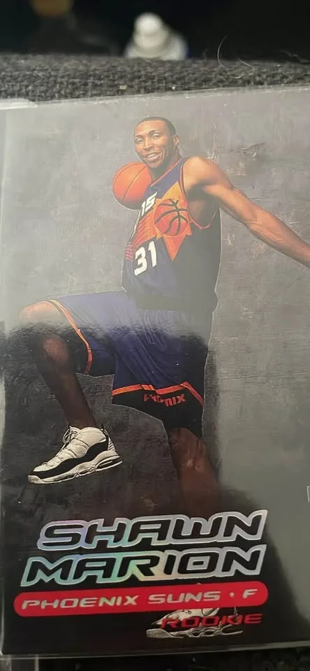 Two Amare Stoudemire Rookie Cards and One Shawn Marion Rookie Ca image indicator(4)