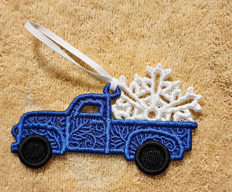 Blue truck with white snowflake Christmas ornament