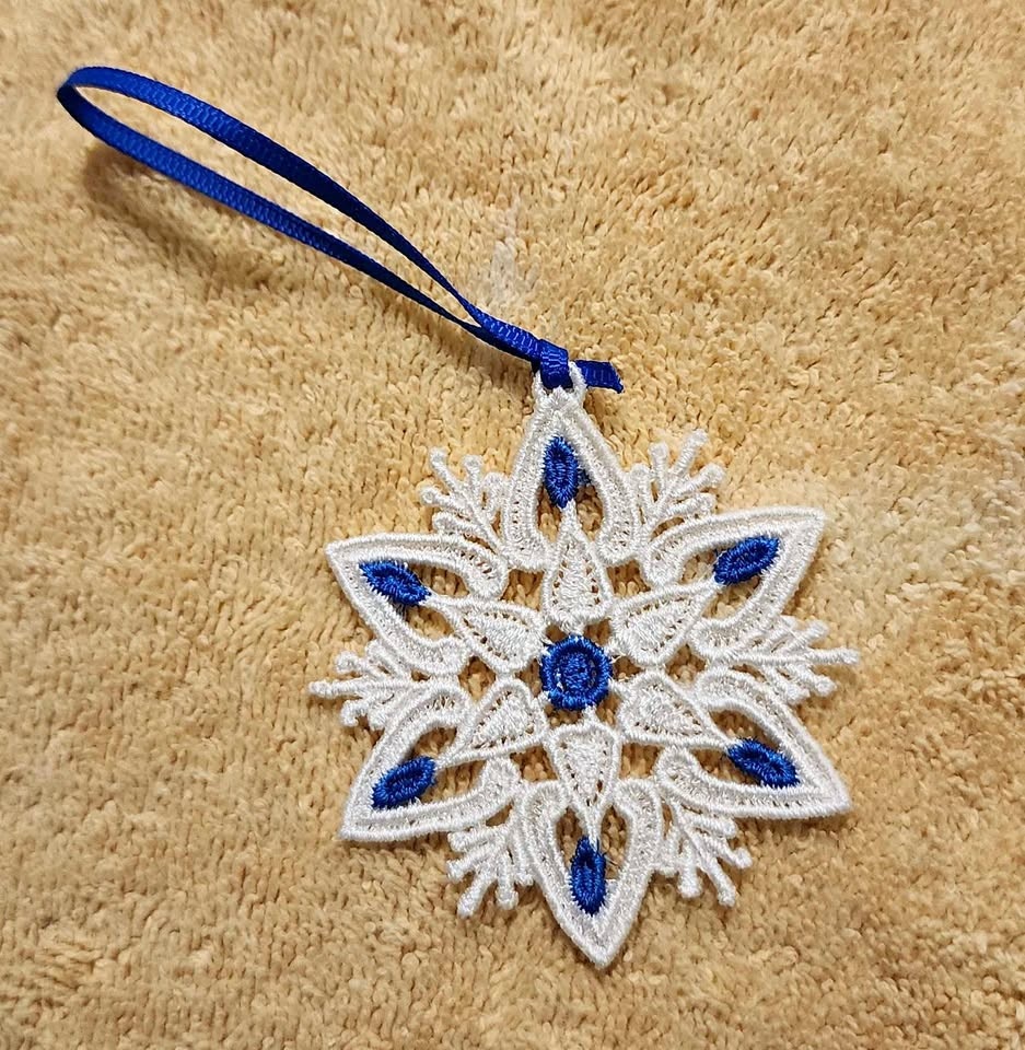 Blue and white snowflake Christmas ornament