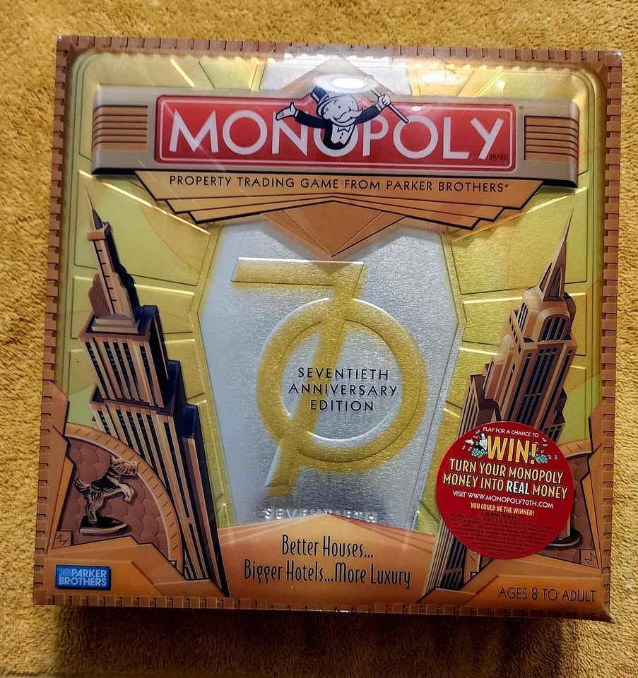 Monopoly 70th Anniversary Edition Board Game in a Tin