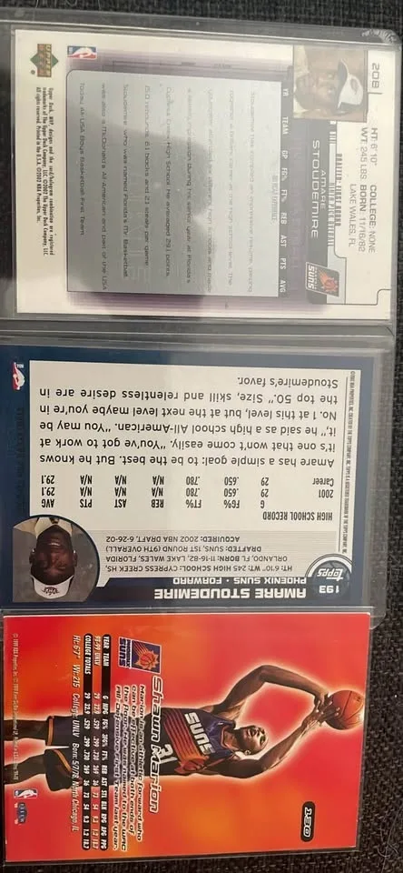 Two Amare Stoudemire Rookie Cards and One Shawn Marion Rookie Ca image indicator(5)